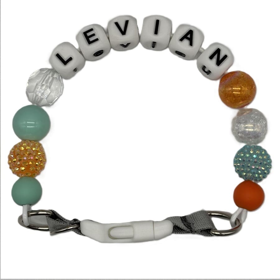 Colorful pacifier clip with beads spelling 'Levian'.