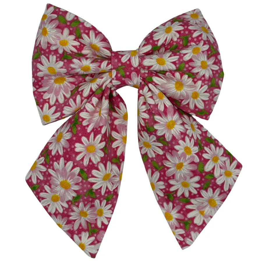 Pink bow with white daisy pattern